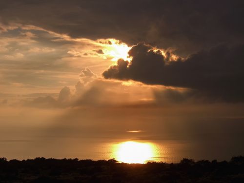 sunset sea clouds