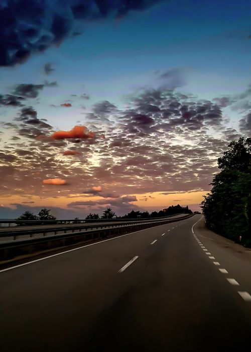 sunset road coastline