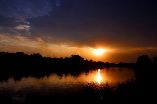 sunset water reflection