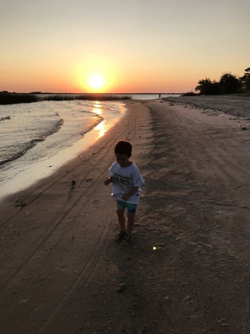 sunset beach child