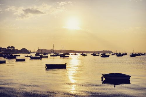 sunset boats sea