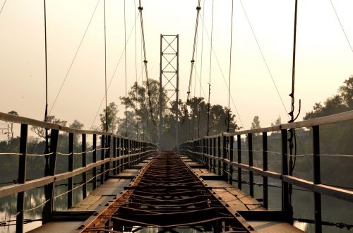 sunset bridge river