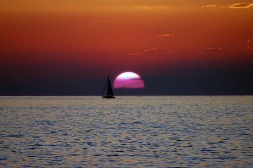 sunset sea sailing