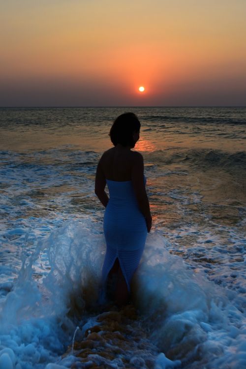 sunset sea woman