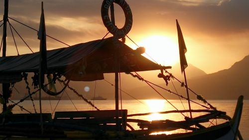 sunset boat artistic
