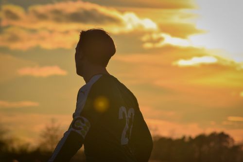 sunset sunbeam football