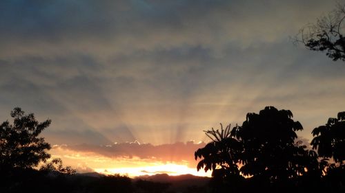 sunset mountain rays