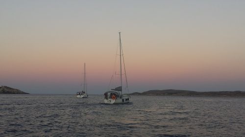 sunset sea boats