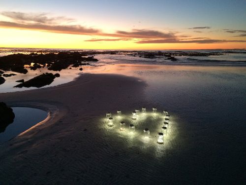 sunset lanterns beach