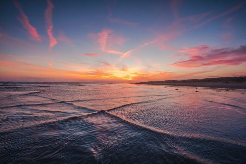 sunset coast waves