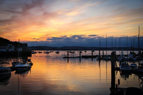 sunset sea boats