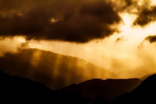 sunset dusk mountains