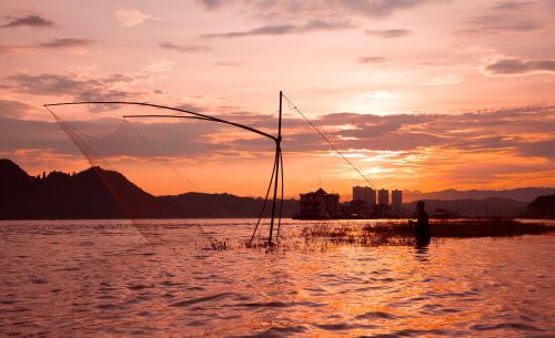 sunset fishermen yichang