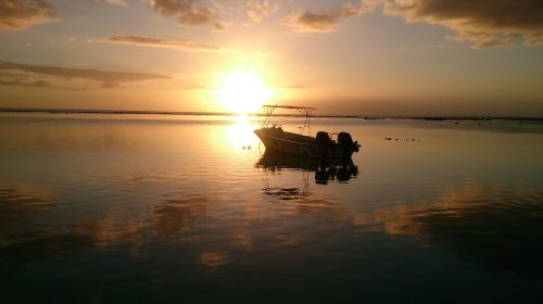sunset sea boat