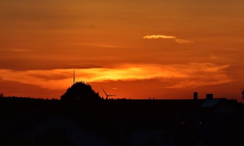 sunset setting sun windräder