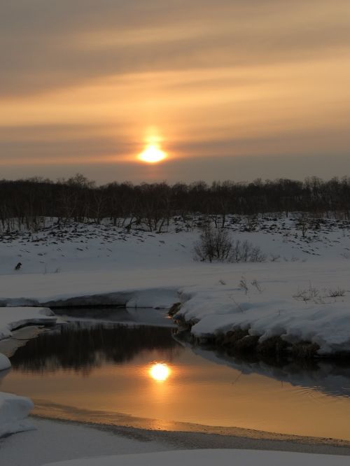 sunset lake river