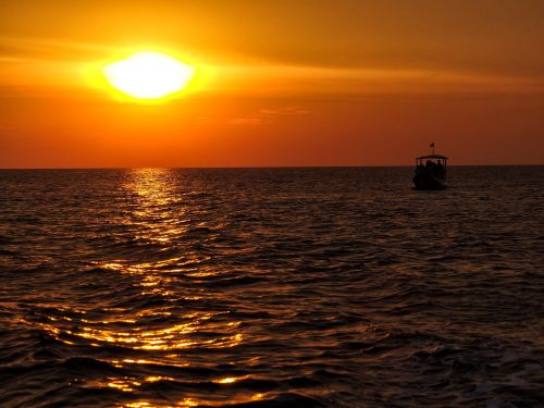sunset boats boat