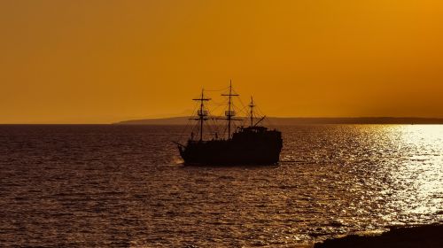 sunset sea boat