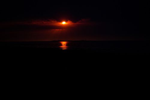 sunset sun by the sea