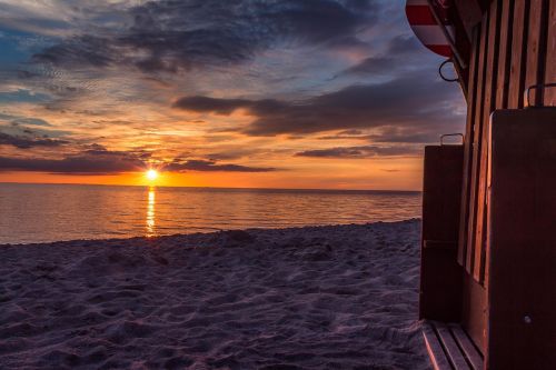 sunset beach chair clouds
