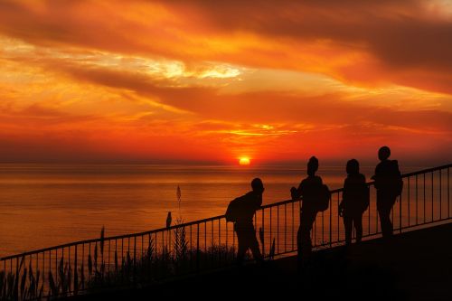 sunset people silhouette