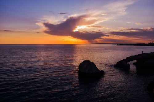sunset rocky coast sea