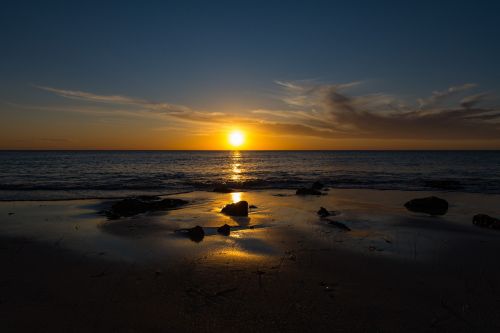 sunset beach rocks