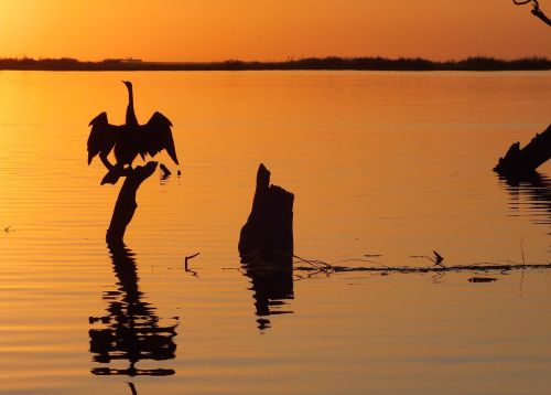 sunset waters reflection