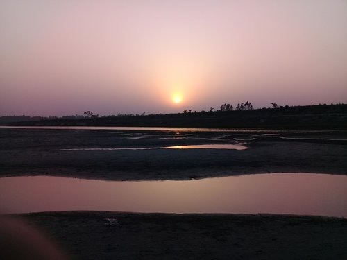 sunset  dawn  water