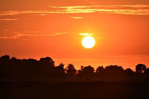 sunset  rheiderland include a  nature