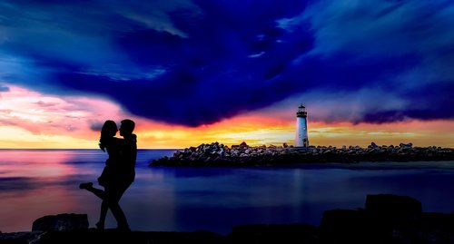 sunset  lighthouse  couple