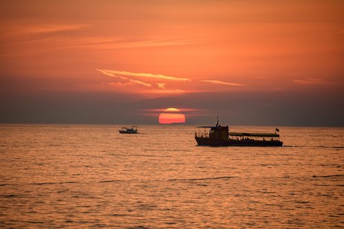 sunset  sea  boat