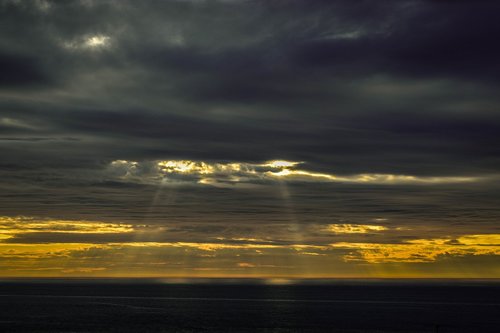 sunset  water  clouds