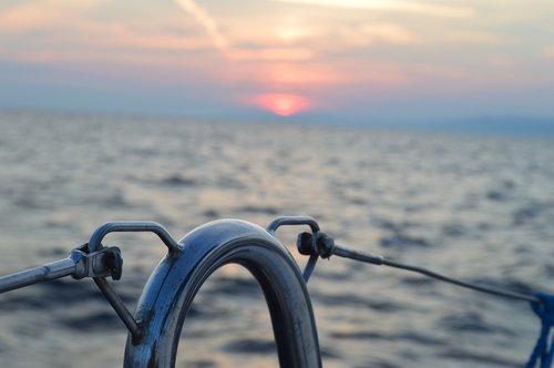 sunset  sailing vessel  sea