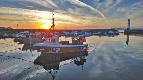 sunset  boats  reflection