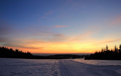 sunset snow mountains