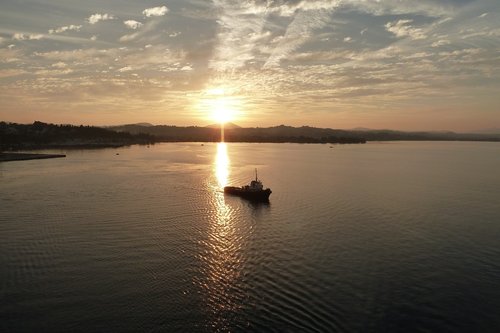 sunset  sea  boat