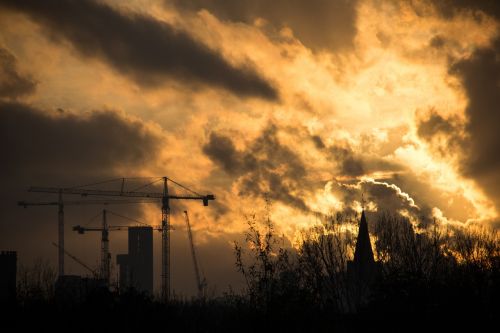 sunset construction crane
