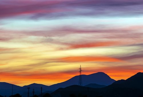 sunset  tower electric  sky