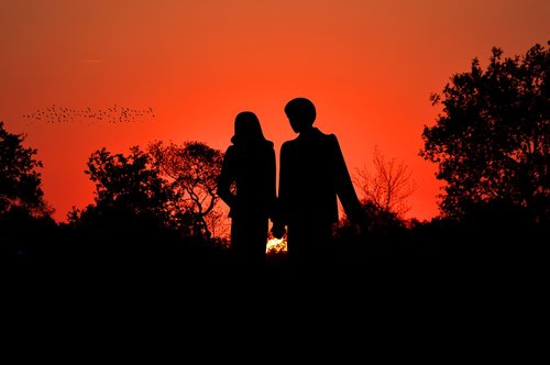 sunset  pair  romantic