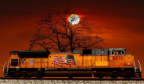 sunset  train american  tree