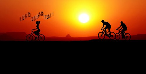 sunset  bicycles  woman