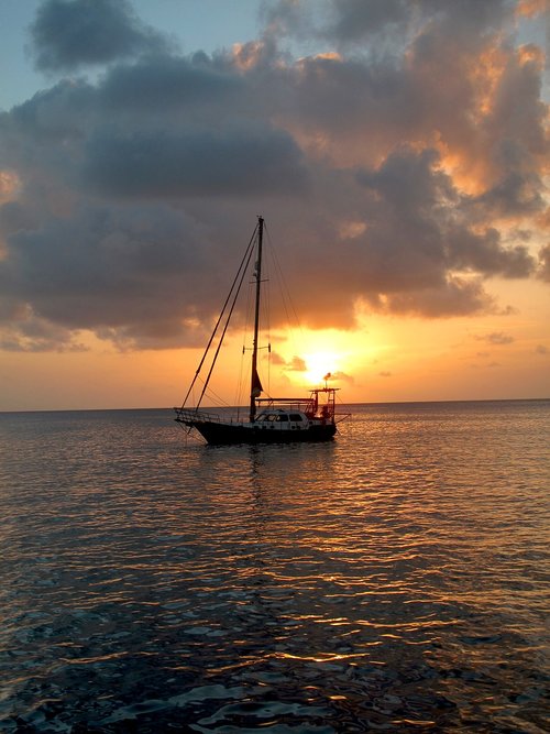 sunset  sailboat  boat