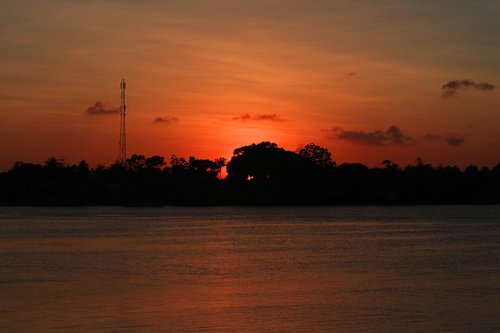 sunset  beach  the sea