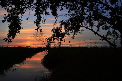 sunset  water  landscape