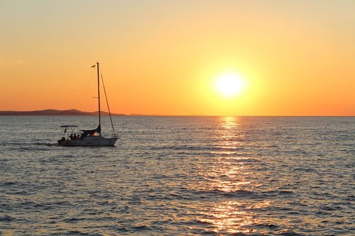 sunset  sea  boat