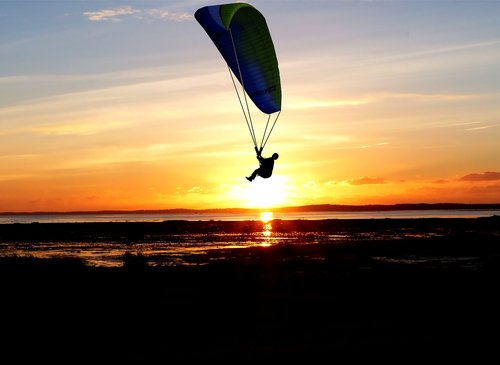 sunset  paragliding  sea