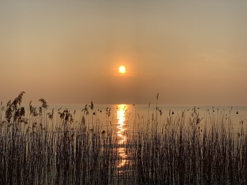 sunset  lake  garda