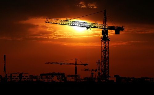 sunset  urban landscape  crane