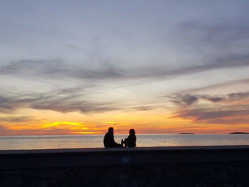 sunset  riverside  couple